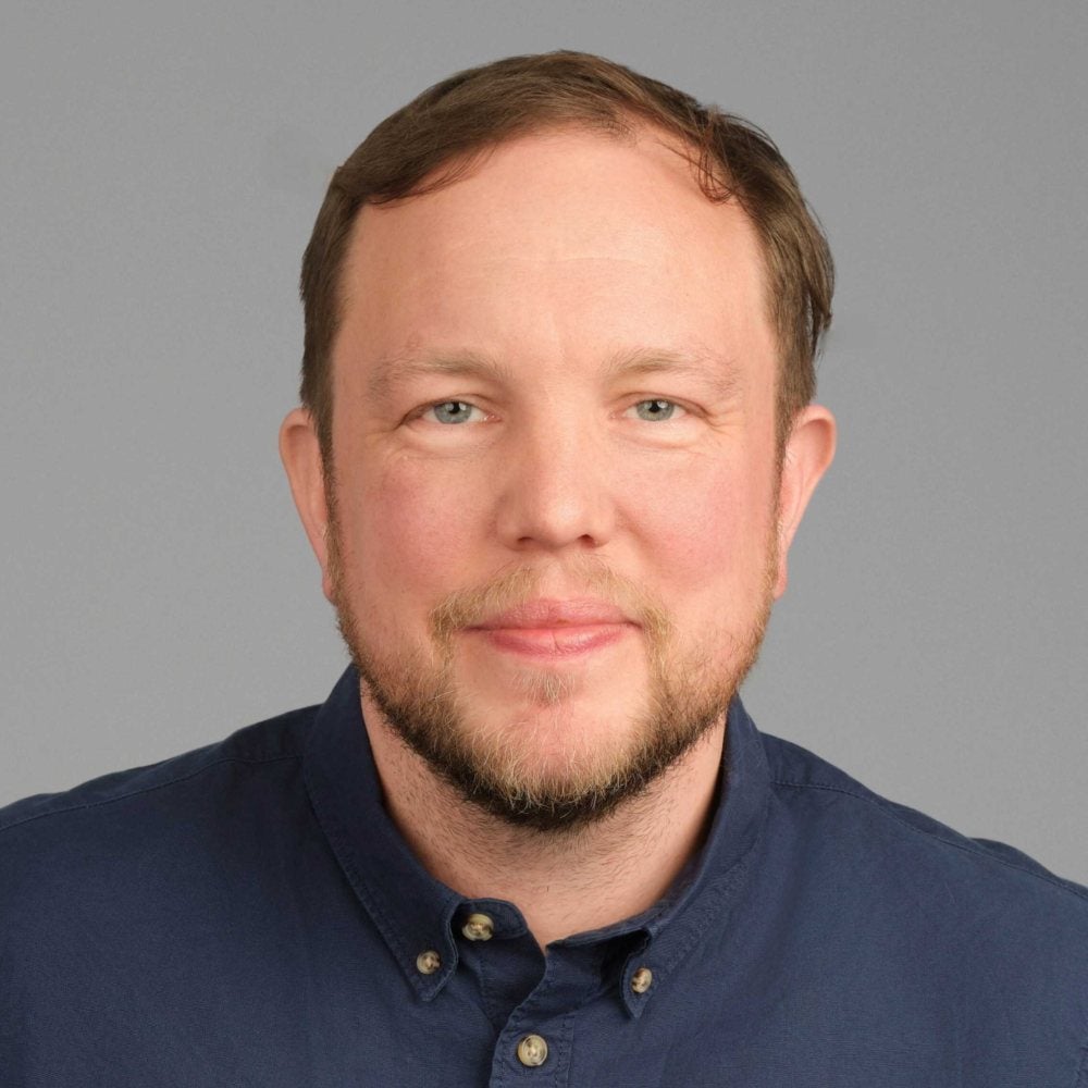 A headshot of David Sandilands of Puppet by Perforce taken in 2024.